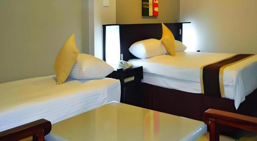 Peninsula International Hotel Сува Экстерьер фото