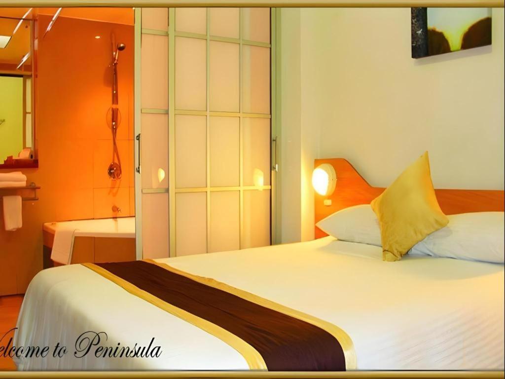 Peninsula International Hotel Сува Экстерьер фото