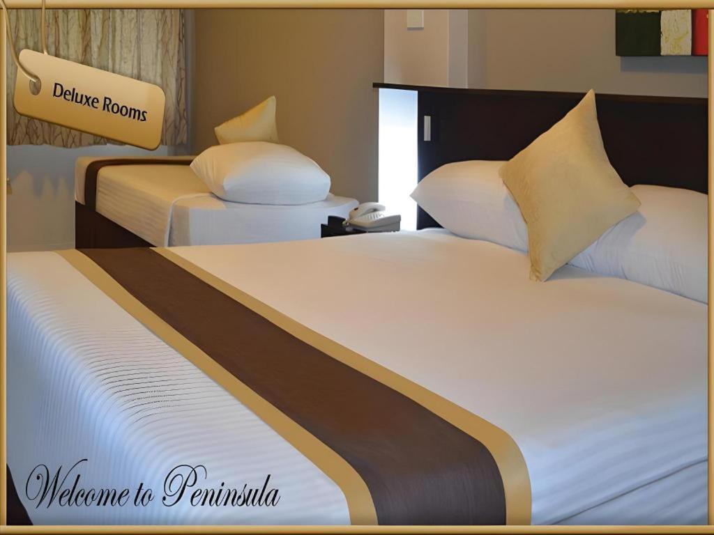Peninsula International Hotel Сува Экстерьер фото