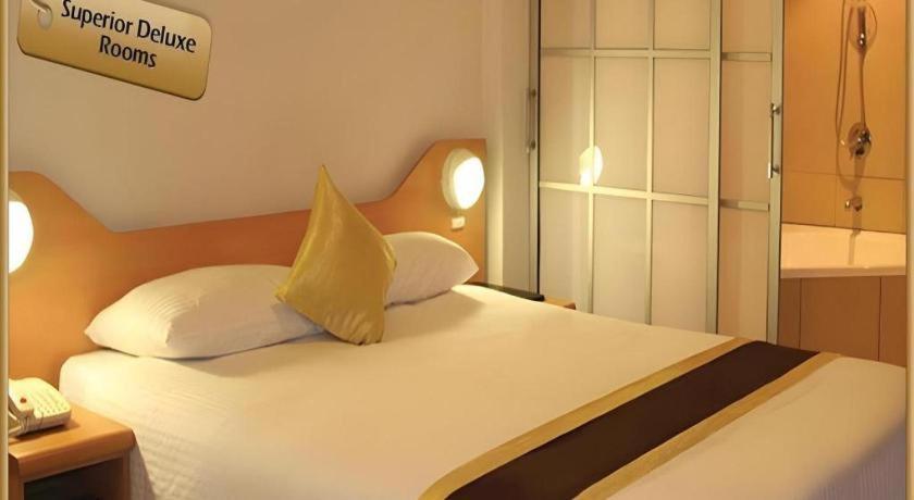 Peninsula International Hotel Сува Экстерьер фото